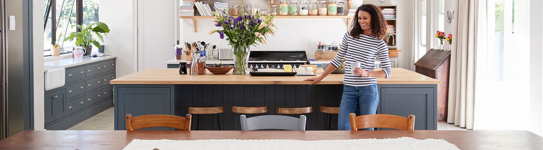 Woman standing in kitchen